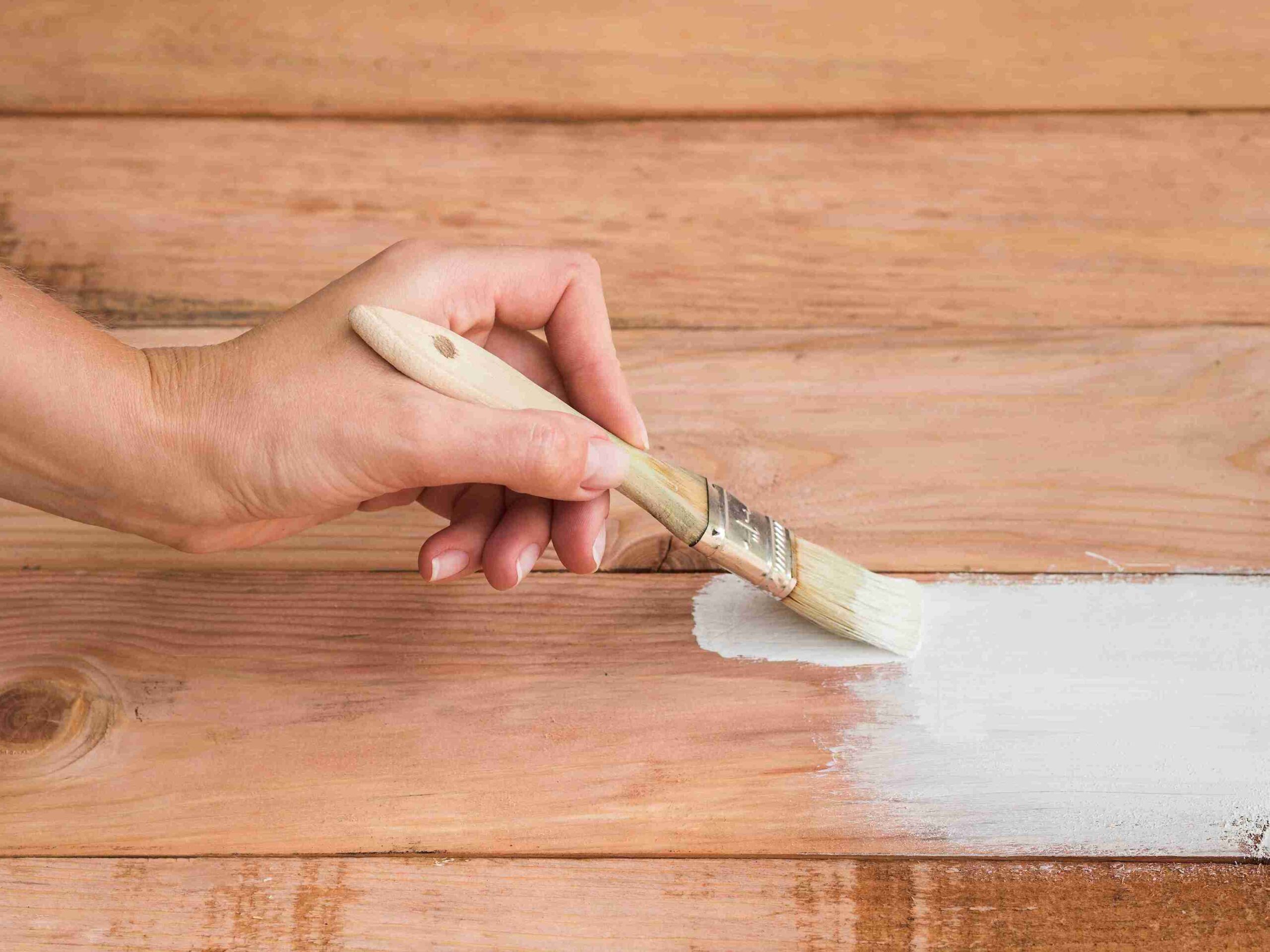 applying primer with brush