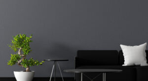 Black sofa in living room with blank table for mock up